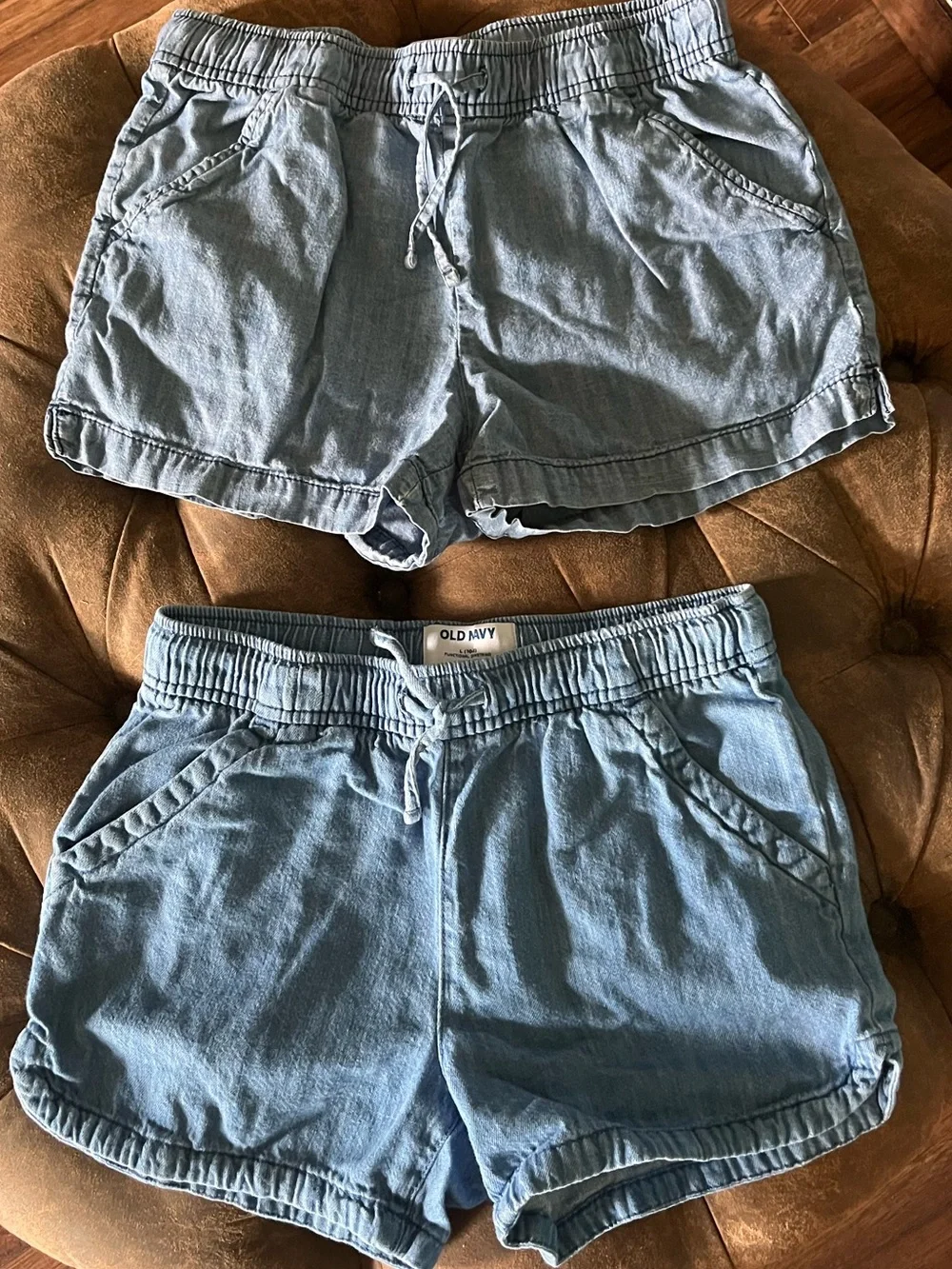 Two pair of girls Old Navy drawstring denim shorts. Both size 10/12.